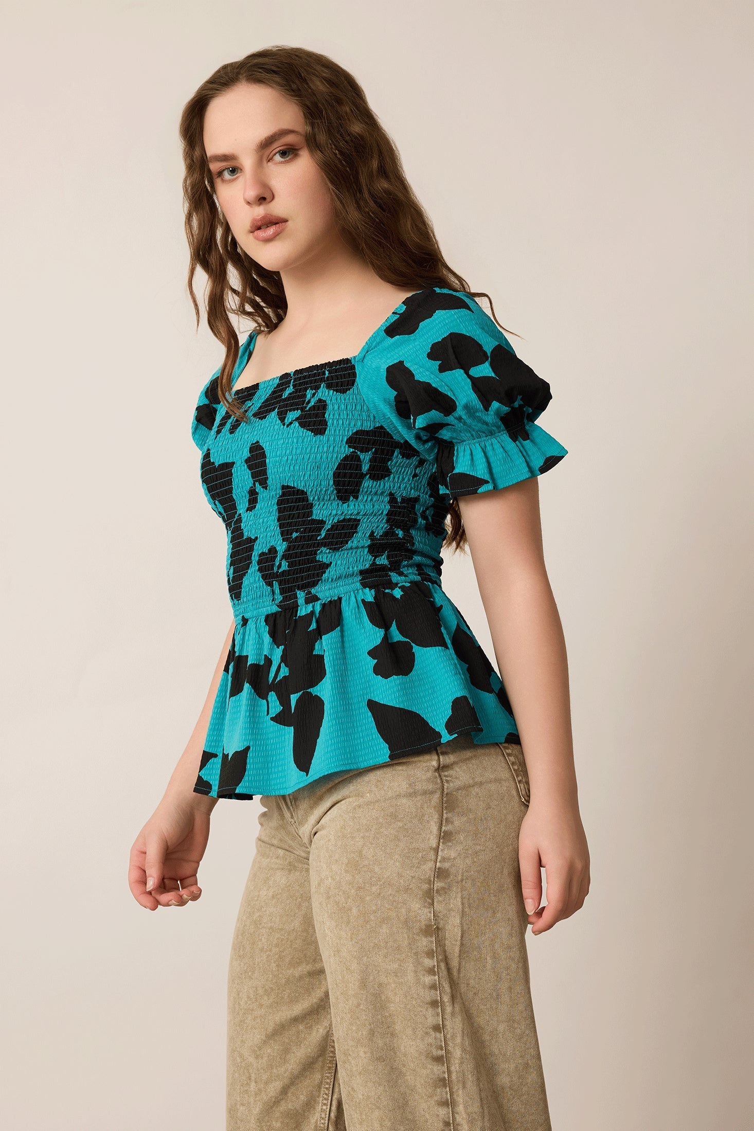 Bailey in Bold Peplum Top In Blue and Black